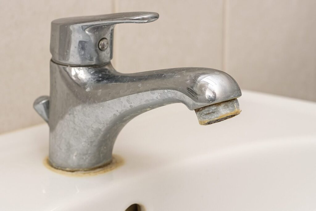 Wasserhahn kalk